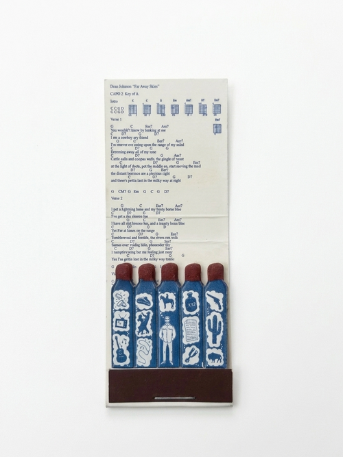 Set of matches with blue and white design on a white background
