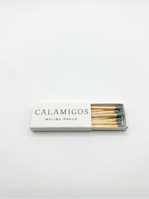 Box of matches with branding on a white background